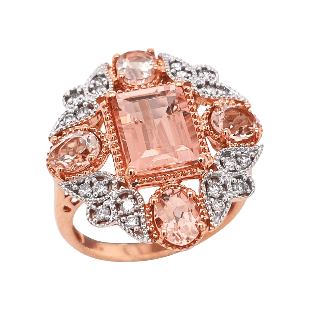 A rose gold ring featuring a large rectangular peach-colored center stone surrounded by smaller peach and clear stones in an ornate floral cluster setting, isolated