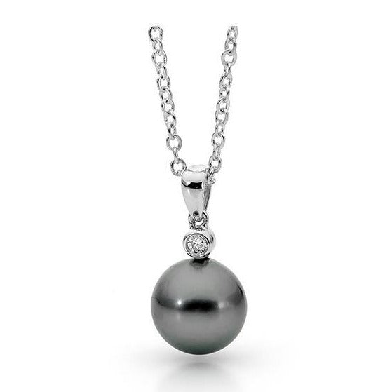 Elevate your jewellery collection with the Marion Tahitian Pendant, a timeless symbol of sophistication. Featuring a striking drop-shaped Tahitian pearl, each piece showcases a rich, luminous lustre with captivating iridescent overtones. Sourced from the pristine waters of French Polynesia, these naturally coloured pearls embody effortless elegance. Whether worn alone or layered, this pendant is a refined statement of luxury and style.