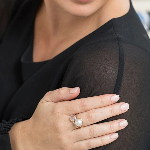 Elegant with a soft, feminine touch, the Pink Moon Ring showcases a luminous white Mabe cultured pearl with a creamy, radiant glow. Accented with a delicate rose quartz detail, it brings a subtle blush of colour that beautifully complements the pearl’s natural beauty. Timeless and versatile, this refined design is perfect for everyday wear or as a meaningful gift for someone special, designed to be cherished for years to come.