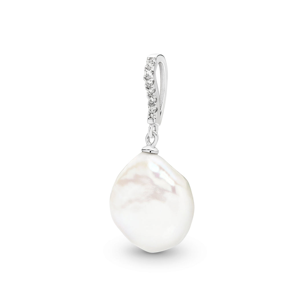 Presenting our Clarissa Pendant, an enchanting blend of sophistication and contemporary allure. Crafted from sterling silver, this pendant boasts sparkling cubic zirconias, complemented by a striking sizable coin-shaped freshwater pearl suspended below, adding an exquisite touch to any ensemble. Pair it with the Clarissa Earrings to curate a truly breathtaking combination.
