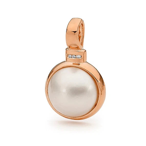 The Margaret Enhancer is the epitome of timeless elegance, featuring a luminous white Mabe cultured pearl with a flawlessly smooth, creamy surface. Set in a sleek diamond-accented bail, this exquisite enhancer adds a touch of refined luxury to any look. Its minimalist yet striking design makes it the perfect piece for effortless, everyday sophistication. 