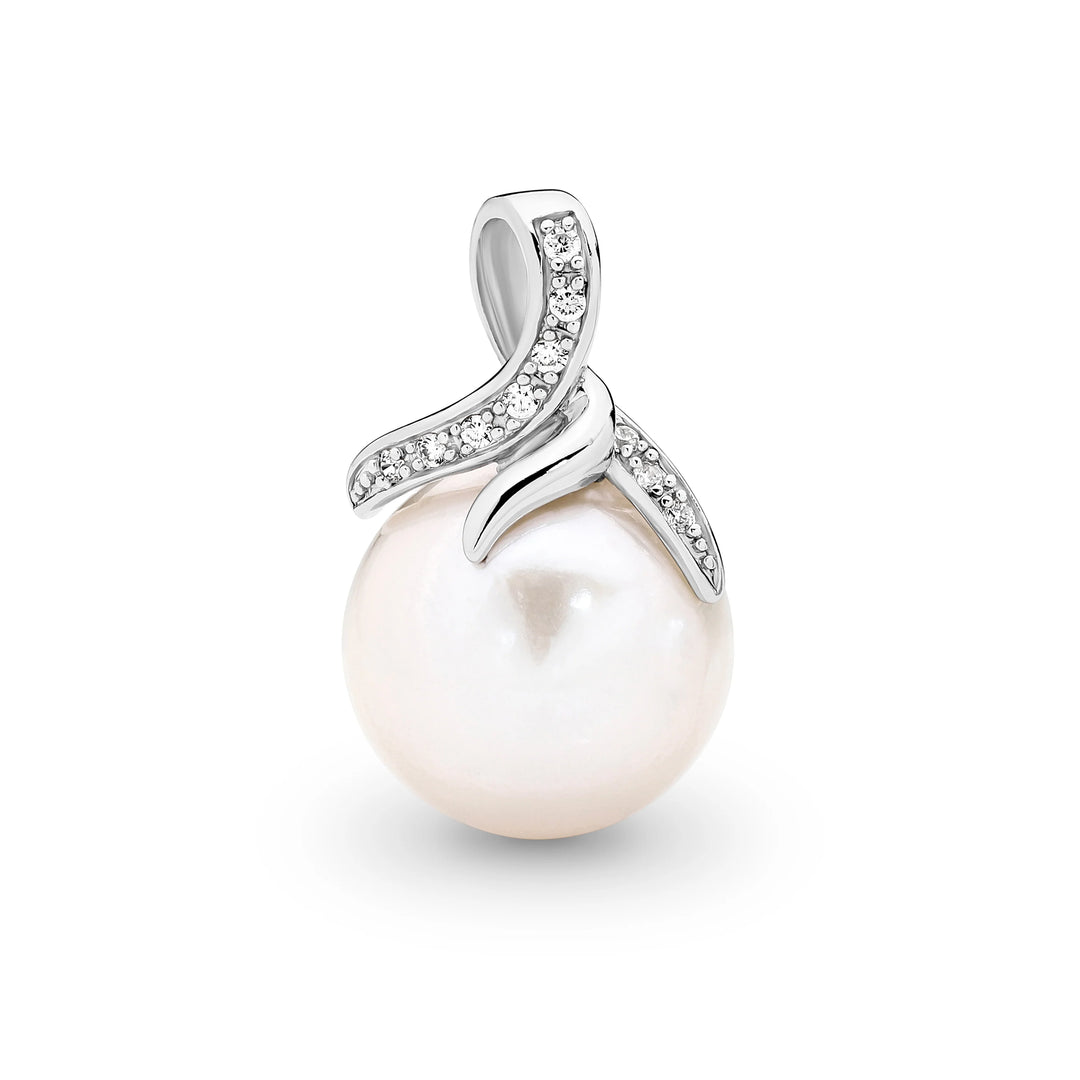 Graceful and refined, the Estelle Pendant showcases a luminous white Edison freshwater pearl cradled in a contemporary claw setting. Sparkling cubic zirconia accents curve gently around the pearl, adding a modern touch to this timeless piece. Crafted in sterling silver, it&