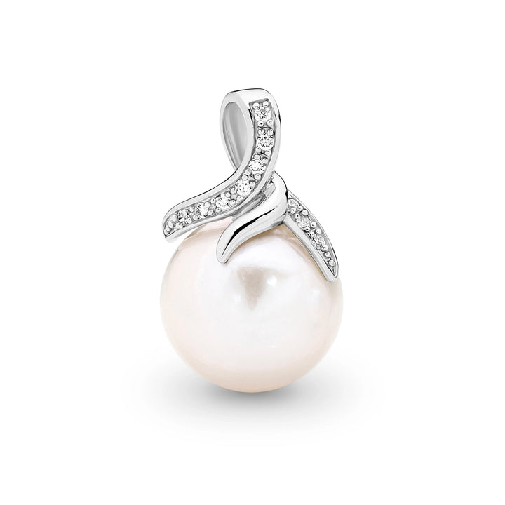 Graceful and refined, the Estelle Pendant showcases a luminous white Edison freshwater pearl cradled in a contemporary claw setting. Sparkling cubic zirconia accents curve gently around the pearl, adding a modern touch to this timeless piece. Crafted in sterling silver, it&