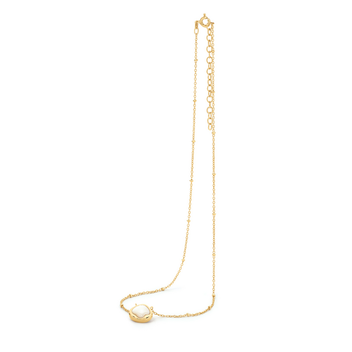 Elegant and effortless, the Kiara Necklace features a uniquely shaped white Mother of Pearl pendant set in yellow gold-plated sterling silver. Suspended on a chain, this piece brings a soft, luminous glow to any neckline — perfect for layering or wearing solo as a subtle statement.