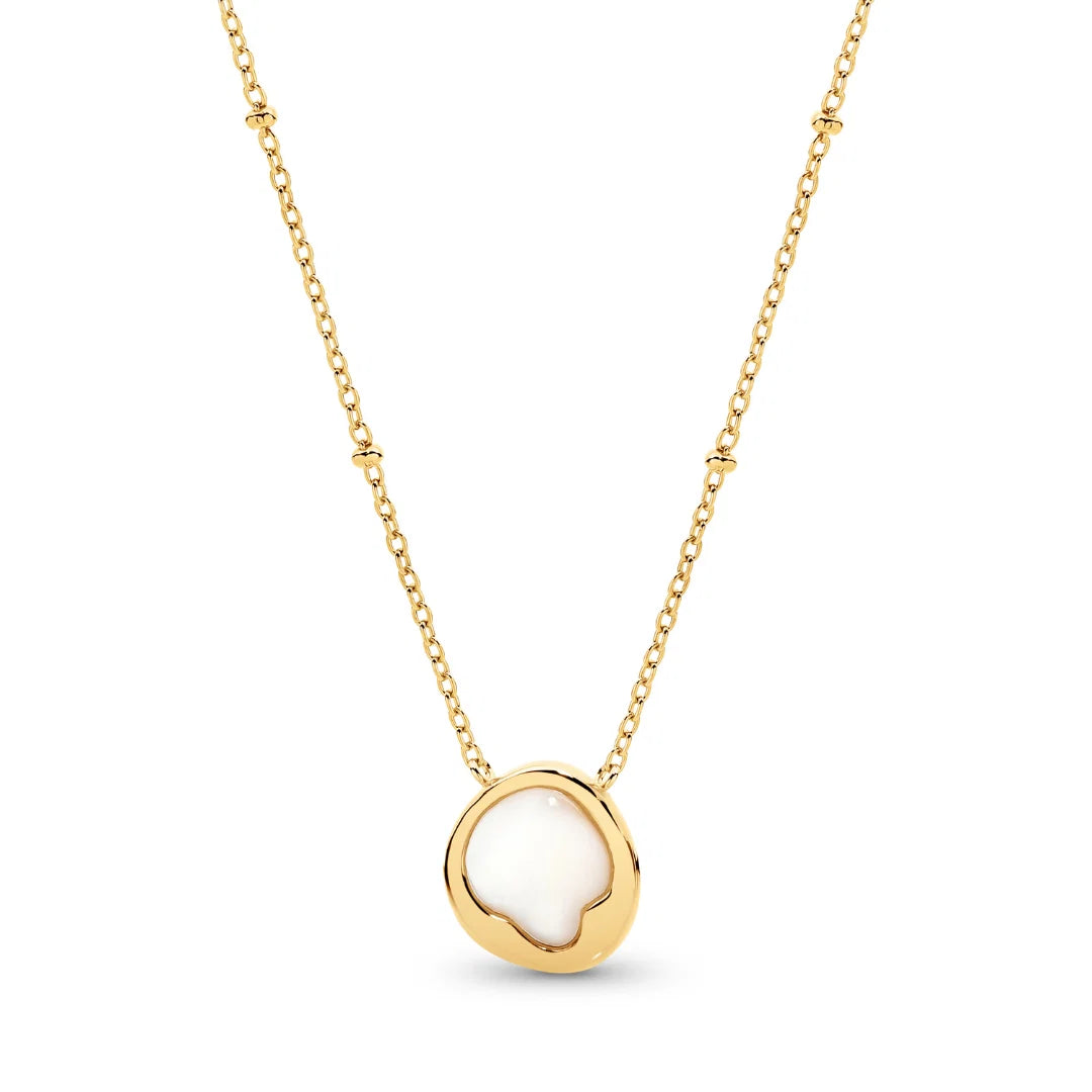 Elegant and effortless, the Kiara Necklace features a uniquely shaped white Mother of Pearl pendant set in yellow gold-plated sterling silver. Suspended on a chain, this piece brings a soft, luminous glow to any neckline — perfect for layering or wearing solo as a subtle statement.
