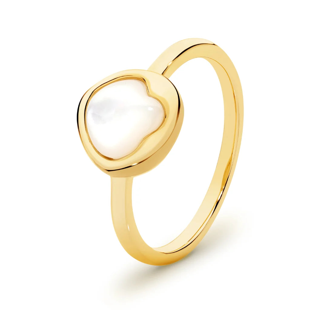 Bold in its simplicity, the Kiara Ring showcases a uniquely shaped white Mother of Pearl set in yellow gold-plated sterling silver. With its soft shimmer and modern profile, this piece brings effortless elegance to your everyday style — perfect worn solo or stacked for added impact.