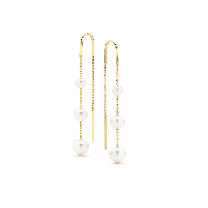 Introducing a captivating blend of sophistication and grace: the Ethereal Pearl Earrings. Imbued with timeless charm, these exquisite earrings are a testament to refined elegance, making a striking statement for those who appreciate the finer things in life.