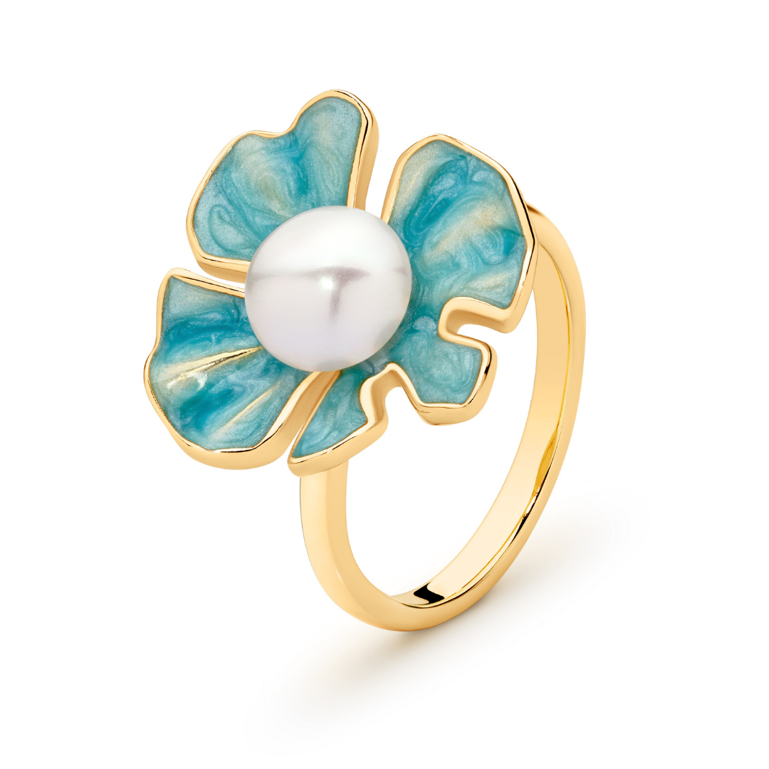 The Posie Ring is a joyful celebration of colour and craftsmanship, crafted in sterling silver with warm yellow gold plating and finished with delicate enamel petals. At its centre sits a luminous white button freshwater pearl, glowing softly against the vibrant enamel and golden tones. Inspired by blooming florals, this design feels playful yet refined, balancing timeless pearl elegance with a fresh, modern twist. 