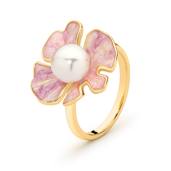 The Posie Ring is a joyful celebration of colour and craftsmanship, crafted in sterling silver with warm yellow gold plating and finished with delicate enamel petals. At its centre sits a luminous white button freshwater pearl, glowing softly against the vibrant enamel and golden tones. Inspired by blooming florals, this design feels playful yet refined, balancing timeless pearl elegance with a fresh, modern twist. 