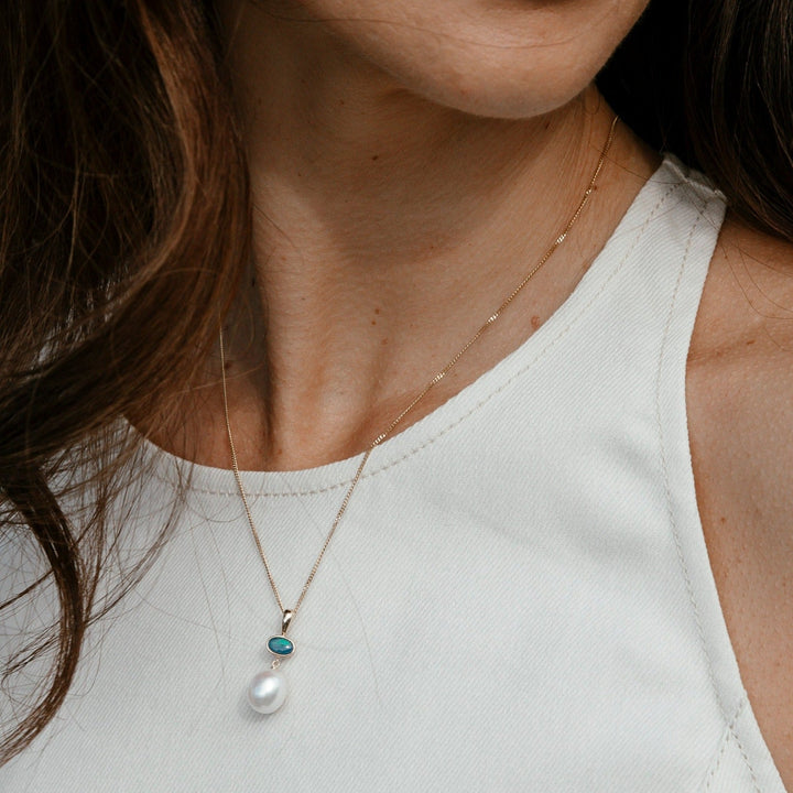 Enhance your wardrobe with a touch of individuality by choosing our light opal pendant, crafted in either 9ct yellow gold or sterling silver. Named in honour of one of Australia&