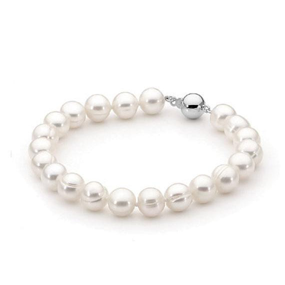 Introducing the Cyra Bracelet – your ultimate choice for a classic, stunning pearl accessory. Our circle freshwater bracelet is the perfect complement for everyday wear, adding a touch of elegance to any outfit. With its durable design and lustrous pearls, secured by a sterling silver ball clasp, you'll find yourself reaching for the Cyra Pearl Bracelet time and time again. 