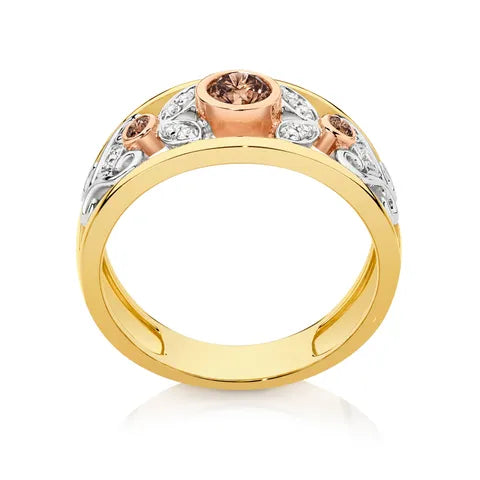 nspired by nature, the Wild Daisy Ring in 9ct yellow, white and rose gold features a warm 0.30ct Australian Chocolate Diamond at its centre, highlighted by a rose gold bezel. Surrounding petals of white round brilliant cut diamonds, set in white gold, add beautiful sparkle and contrast. The design is finished with yellow gold rails, creating a timeless celebration of Australian beauty and individuality.