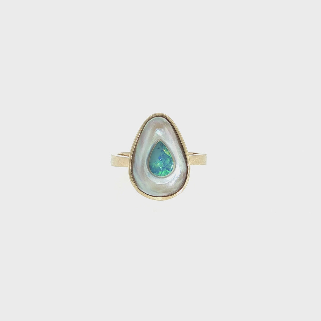 Discover this stunning piece from the Earth+Ocean Jewellery collection, featuring a unique Solid Opal and South Sea Mabe Pearl. Each piece showcases a natural fusion of opal encased in nacre layers by a Batwing Oyster, creating a one-of-a-kind treasure. This collection captures the essence of natural beauty, offering exclusive jewellery that seamlessly blends oceanic and earthy elements through a remarkable natural process.