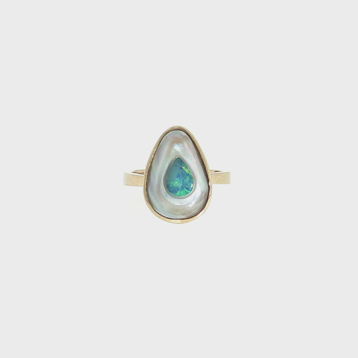 Discover this stunning piece from the Earth+Ocean Jewellery collection, featuring a unique Solid Opal and South Sea Mabe Pearl. Each piece showcases a natural fusion of opal encased in nacre layers by a Batwing Oyster, creating a one-of-a-kind treasure. This collection captures the essence of natural beauty, offering exclusive jewellery that seamlessly blends oceanic and earthy elements through a remarkable natural process.